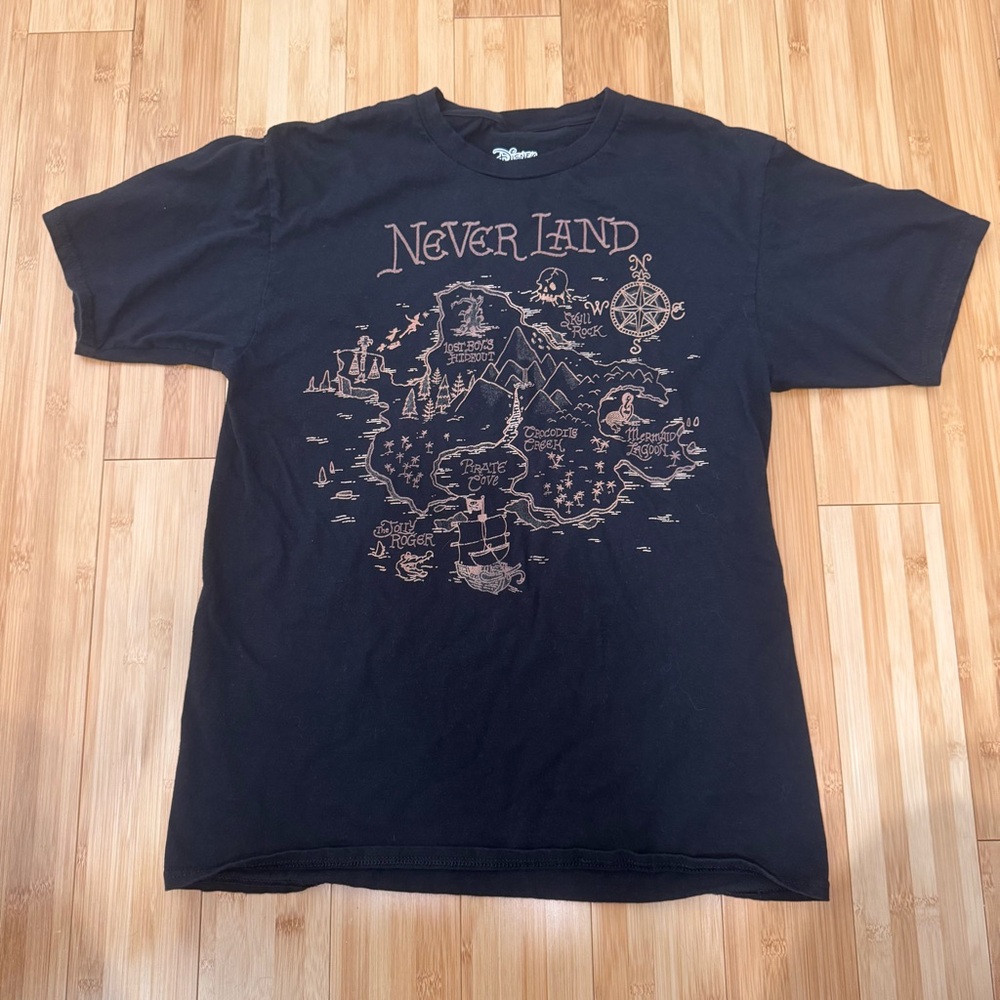 Unisex Disney Neverland Black T-Shirt no size listed. Pit to Pit  19” Length 25”